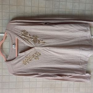 Akemi + Kin Anthropologie tan long sleeve shirt with beaded decal.